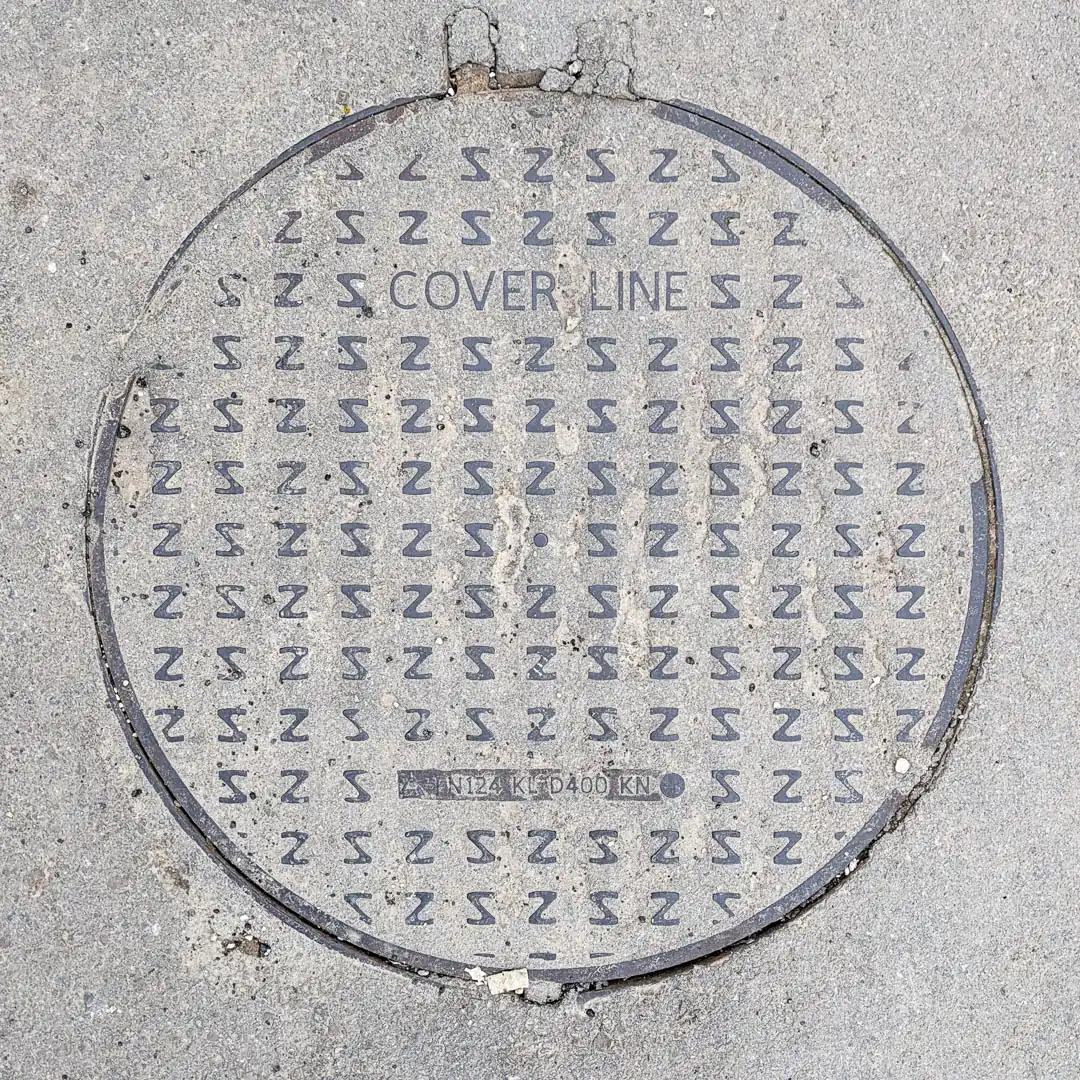Manhole Cover by Radujator Zrenajin in Budva, Montenegro. Photo by Denis Panin