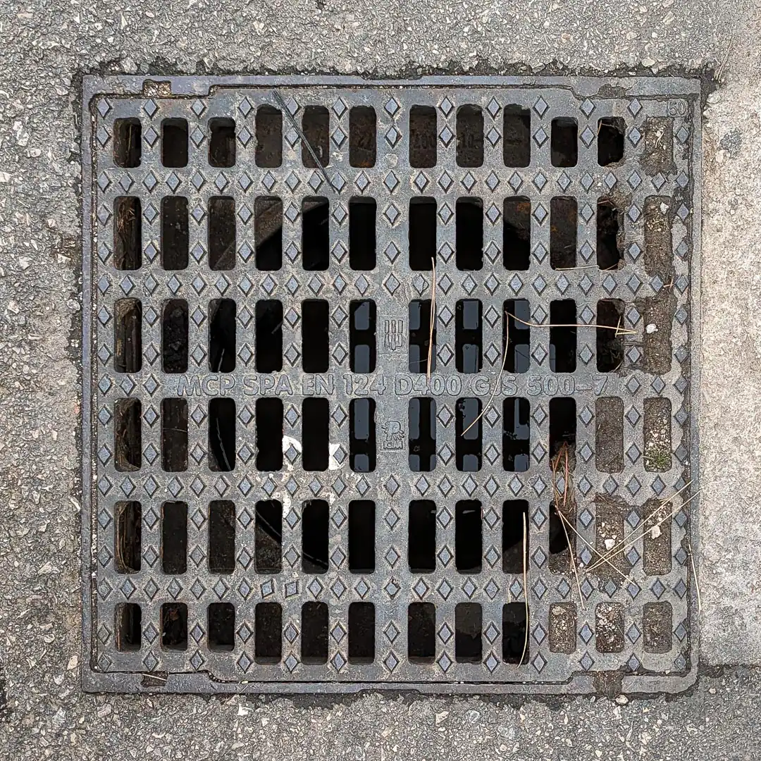 Drainage Manhole Cover in Bar, Montenegro. Photo by Denis Panin
