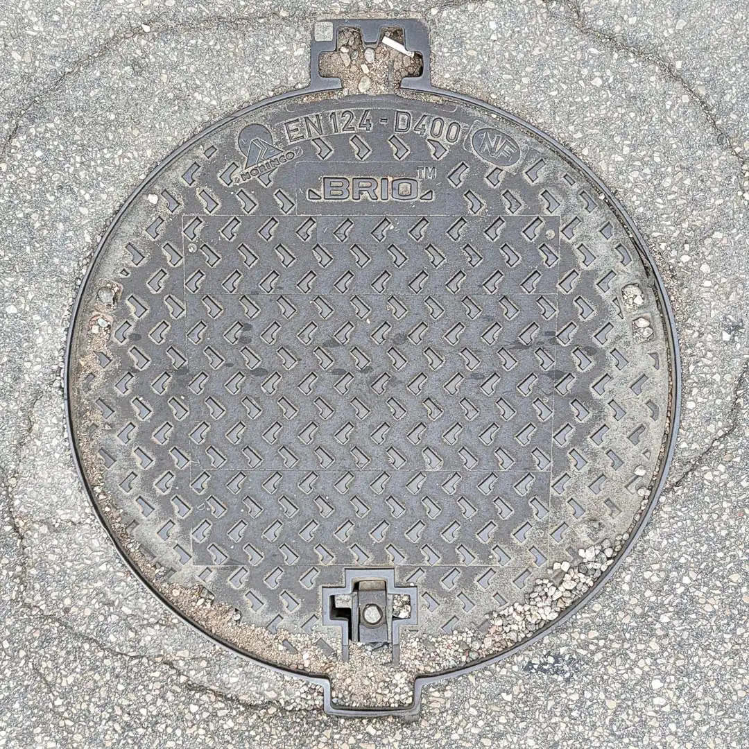 Manhole Cover by Norinco in Budva, Montenegro. Photo by Denis Panin