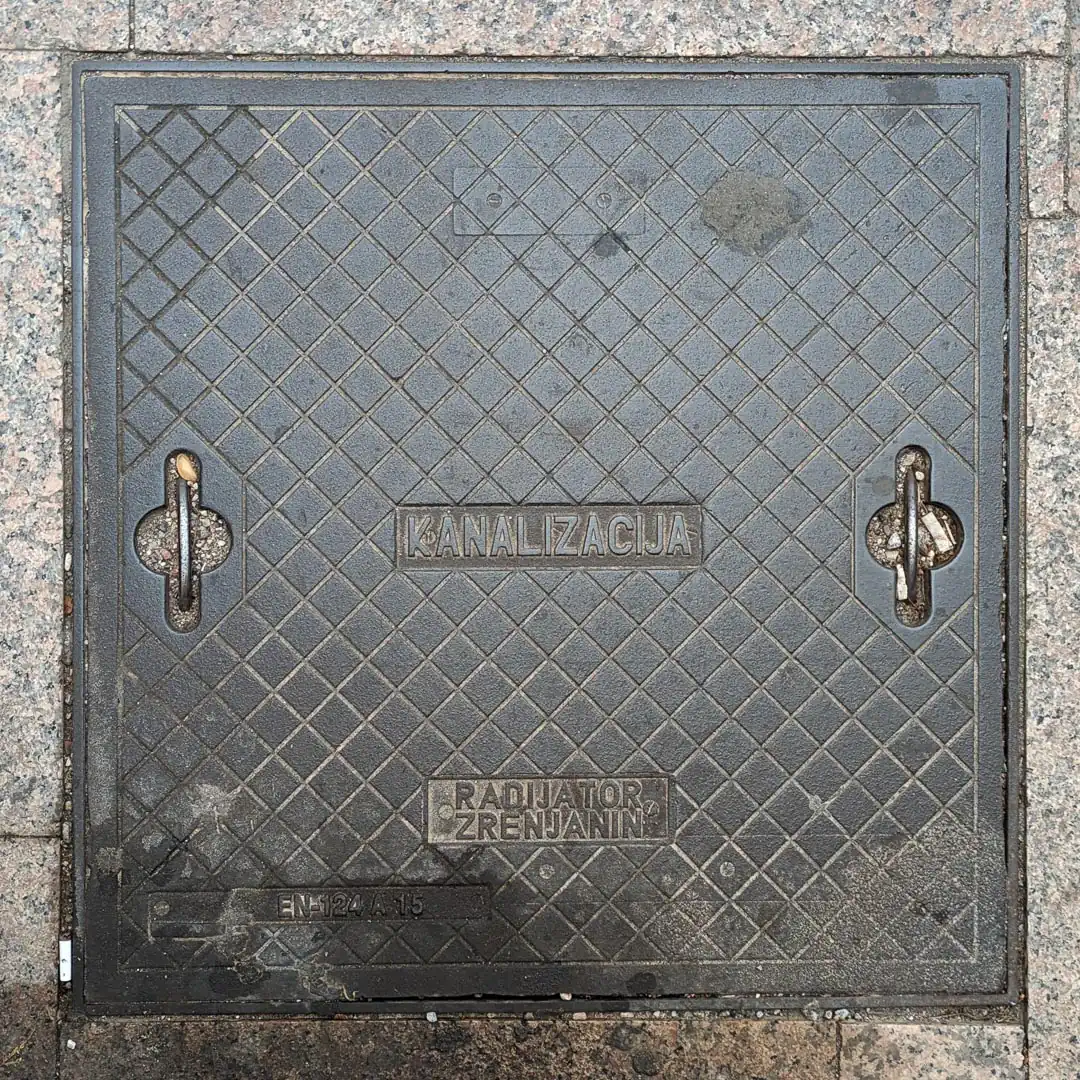 Sewerage Manhole Cover by Radijator Zrenjanin in Budva, Montenegro. Photo by Denis Panin