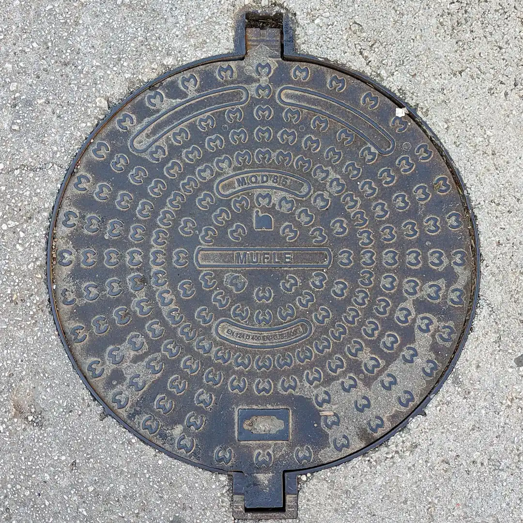 Manhole Cover in Budva, Montenegro. Photo by Denis Panin