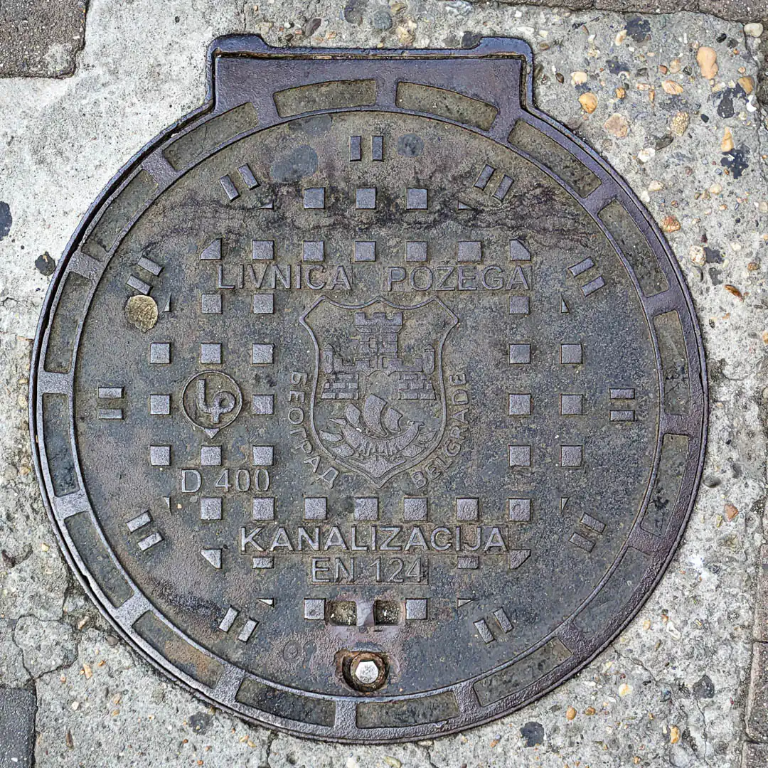 Sewerage Manhole Cover by Livnica Požega in Belgrade, Serbia. Photo by Denis Panin