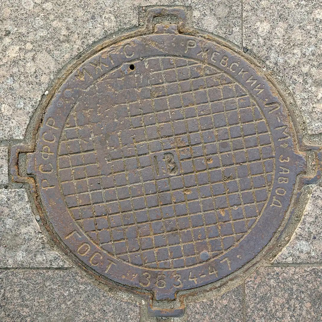 Rzhevsky Foundry and Mechanical Plant Manhole Cover in Veliky Novgorod, Russia. Photo by Yuri Matrosovich