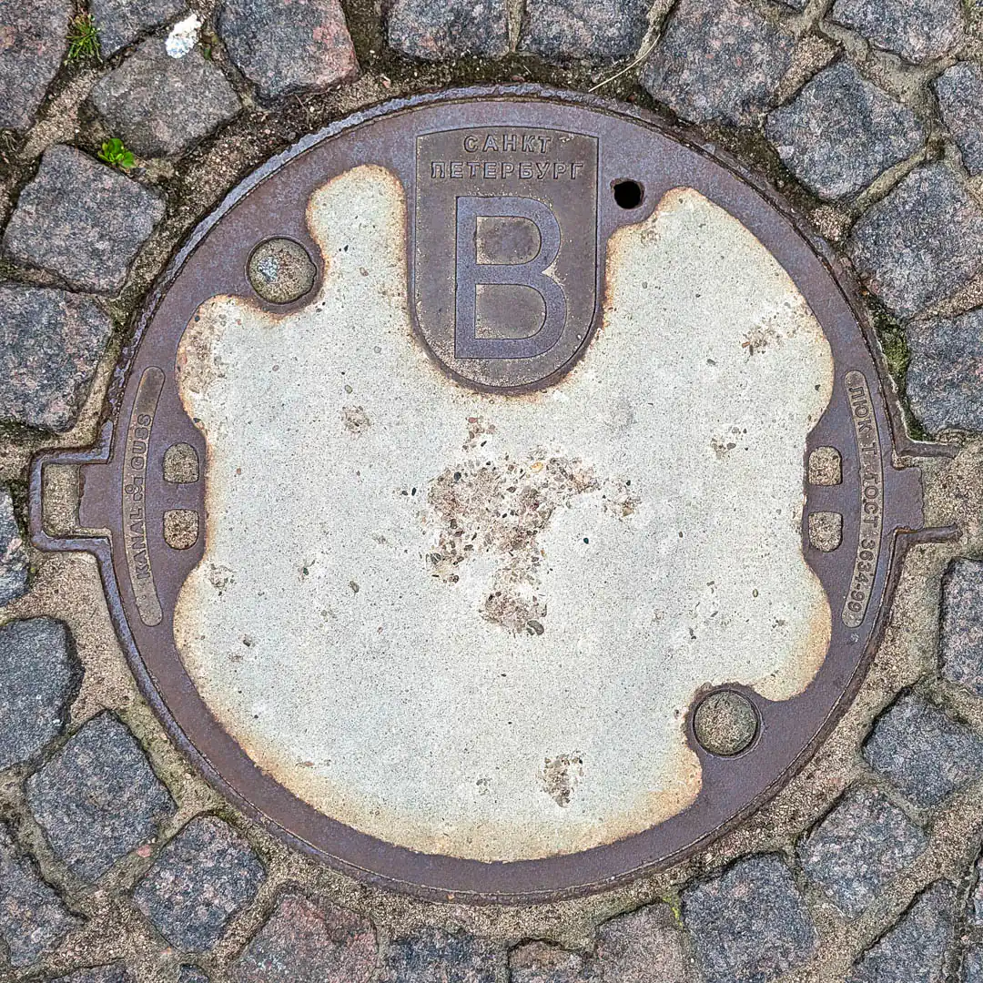 Water Manhole Cover by MeierGuss in Saint Petersburg, Russia. Photo by Yuri Matrosovich