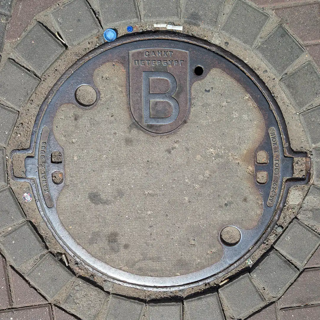 Water Manhole Cover by MeierGuss in Saint Petersburg, Russia. Photo by Yuri Matrosovich
