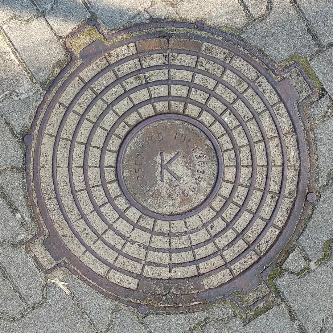 Sewerage Manhole Cover in Kaliningrad, Russia. Photo by Yuri Matrosovich