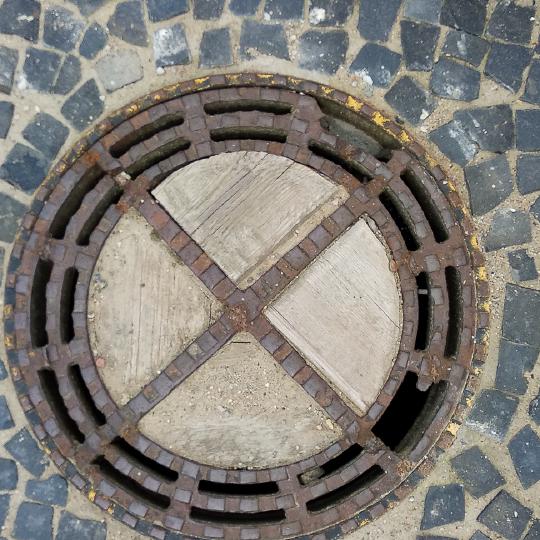 Manhole cover preserved since the time of East Prussia