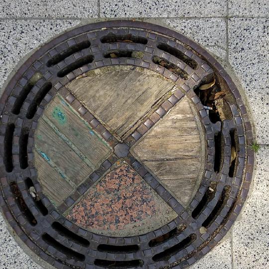 Manhole cover preserved since the time of East Prussia
