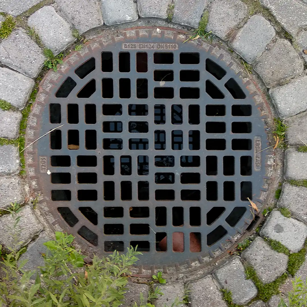 Drainage Manhole Cover by KASI in Kaliningrad, Russia. Photo by Yuri Matrosovich