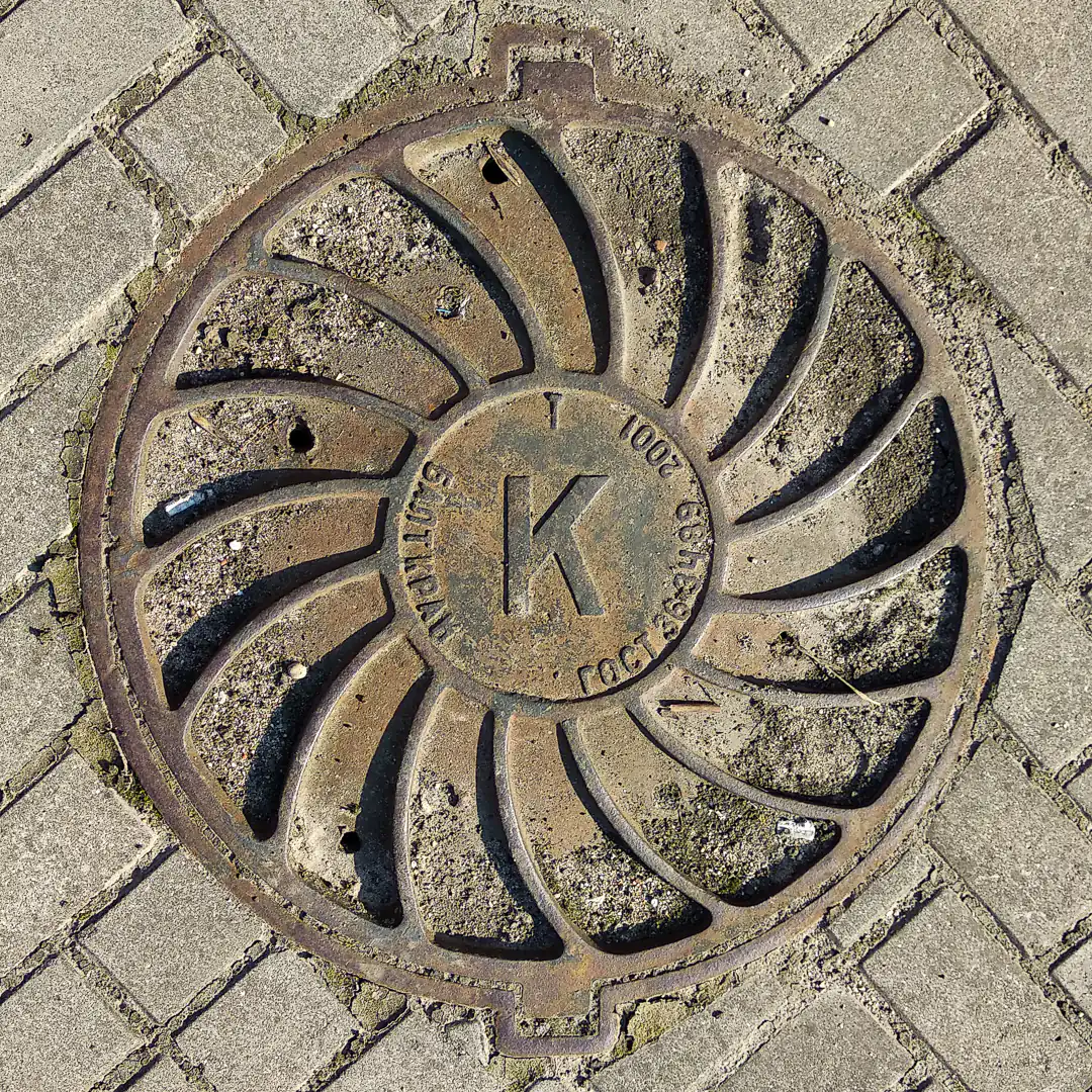 Sewerage Manhole Cover by Балткран in Kaliningrad, Russia. Photo by Yuri Matrosovich