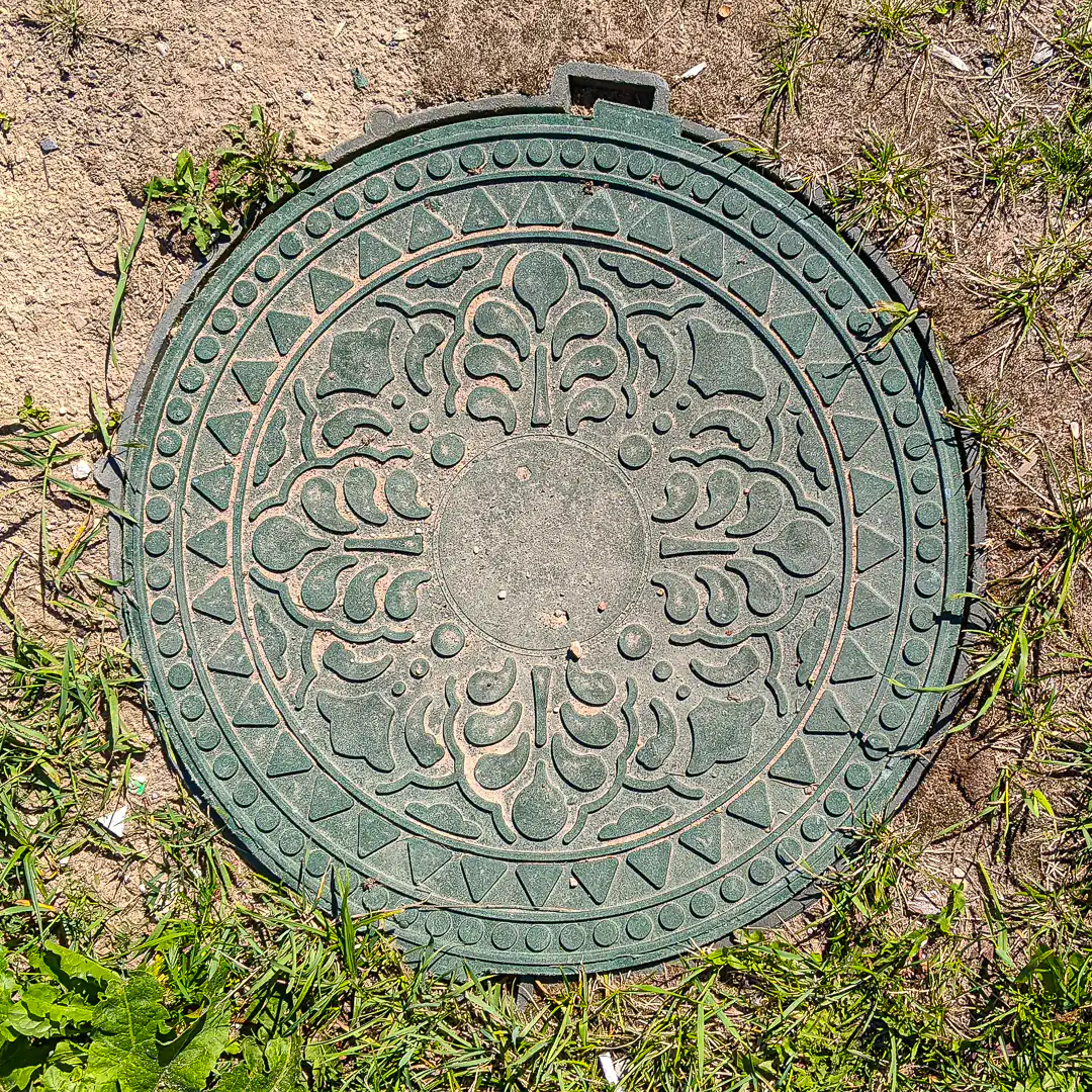 Manhole Cover in Pskov, Russia. Photo by Yuri Matrosovich