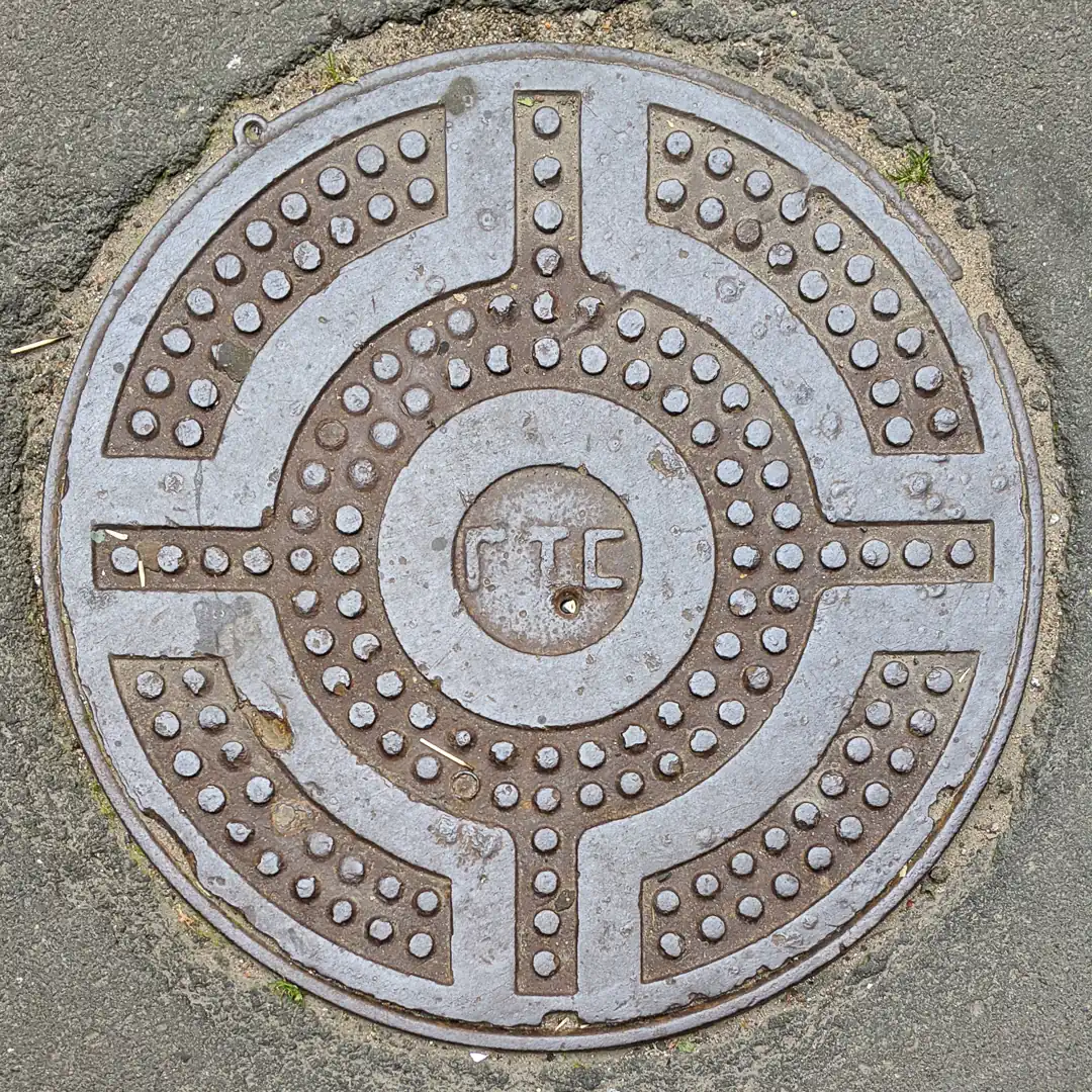Cable Manhole Cover in Saint Petersburg, Russia. Photo by Yuri Matrosovich