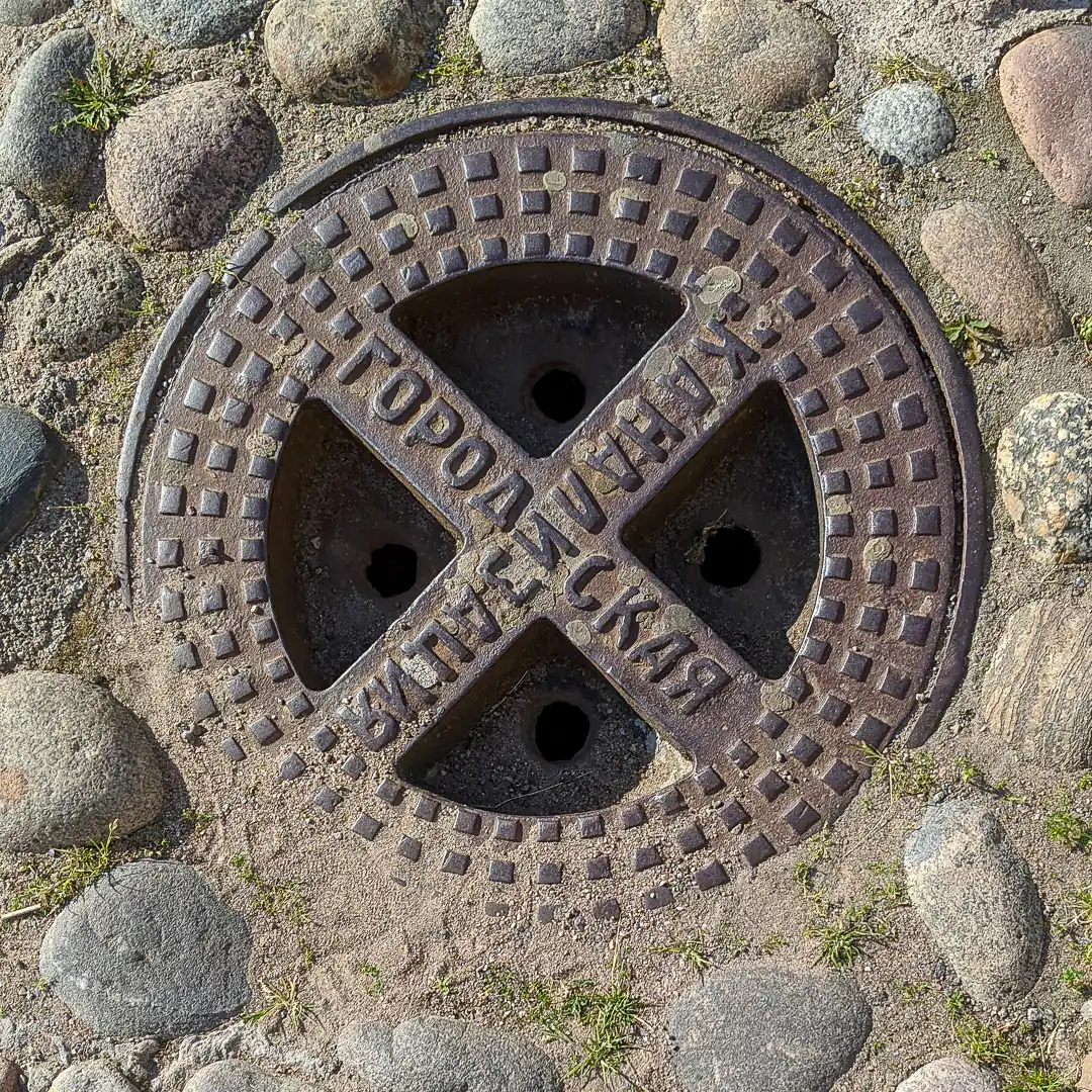 Sewerage Manhole Cover in Saint Petersburg, Russia. Photo by Yuri Matrosovich