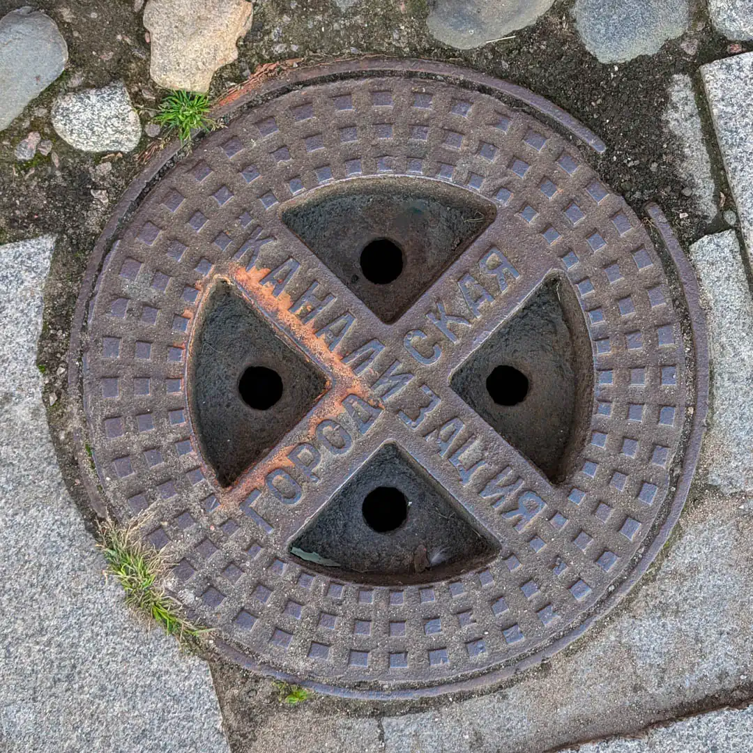 Sewerage Manhole Cover in Saint Petersburg, Russia. Photo by Yuri Matrosovich