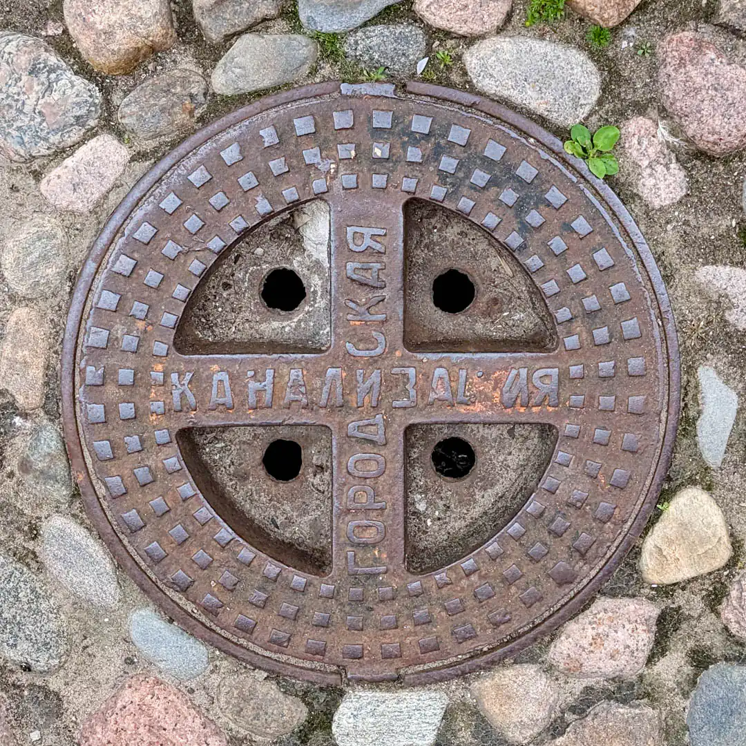 Sewerage Manhole Cover in Saint Petersburg, Russia. Photo by Yuri Matrosovich