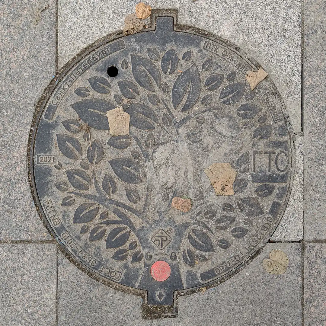 Telephone Cable Manhole Cover with Floral Pattern in Saint Petersburg, Russia. Photo by Yuri Matrosovich