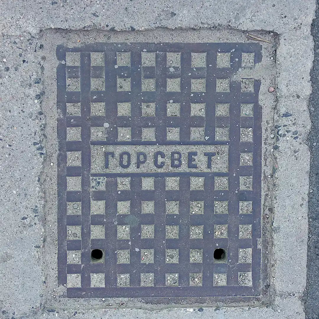 Lighting Manhole Cover in Kaliningrad, Russia. Photo by Yuri Matrosovich