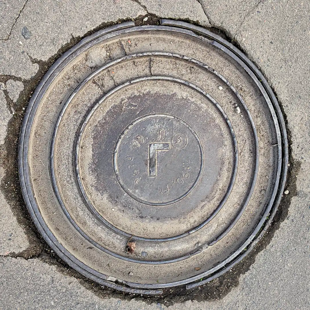 Hydrant Manhole Cover in Veliky Novgorod, Russia. Photo by Yuri Matrosovich