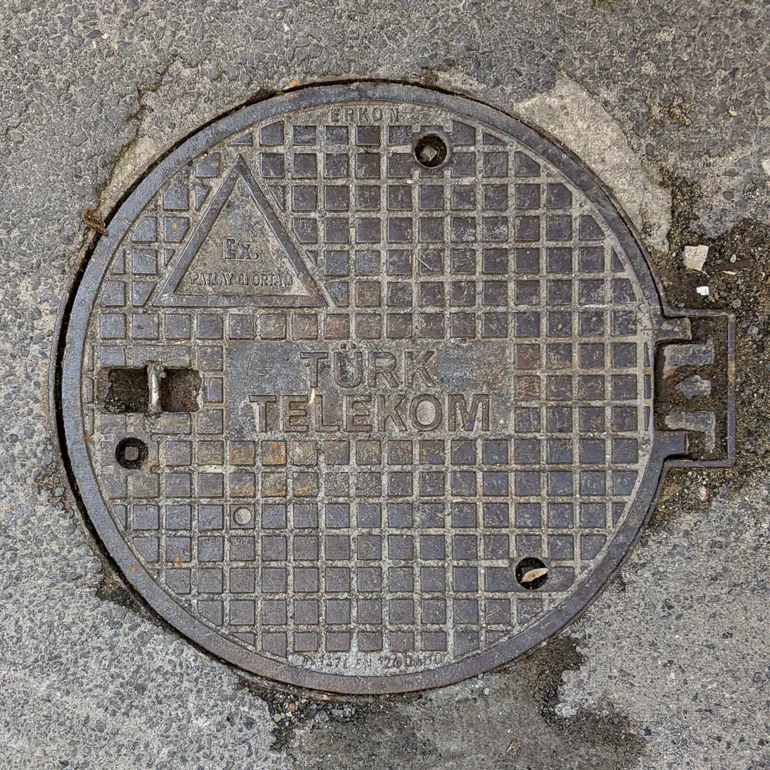 Türk Telekom Manhole Cover in Istanbul, Turkey. Photo by Yuri Matrosovich